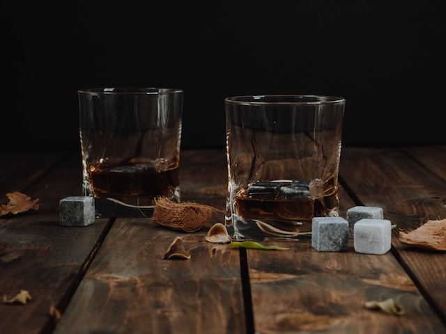 whiskey glass on wooden table